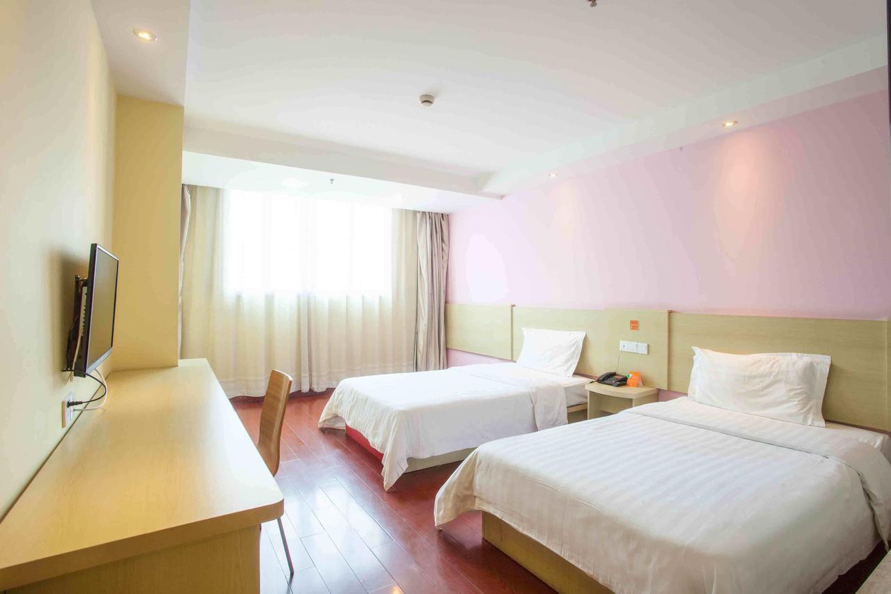 7Days Inn Lingshui Beidou Road Kamer foto