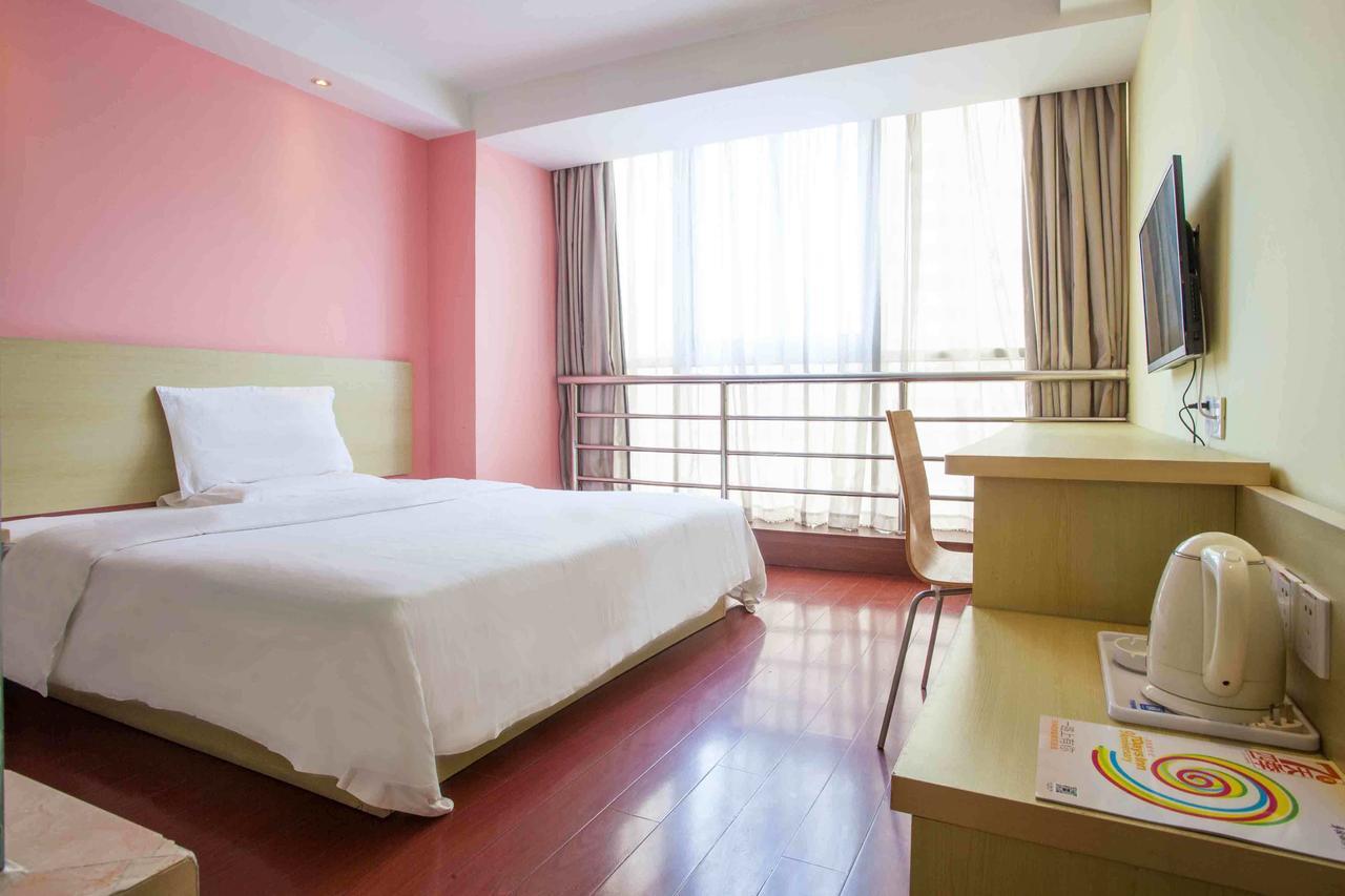7Days Inn Lingshui Beidou Road Kamer foto