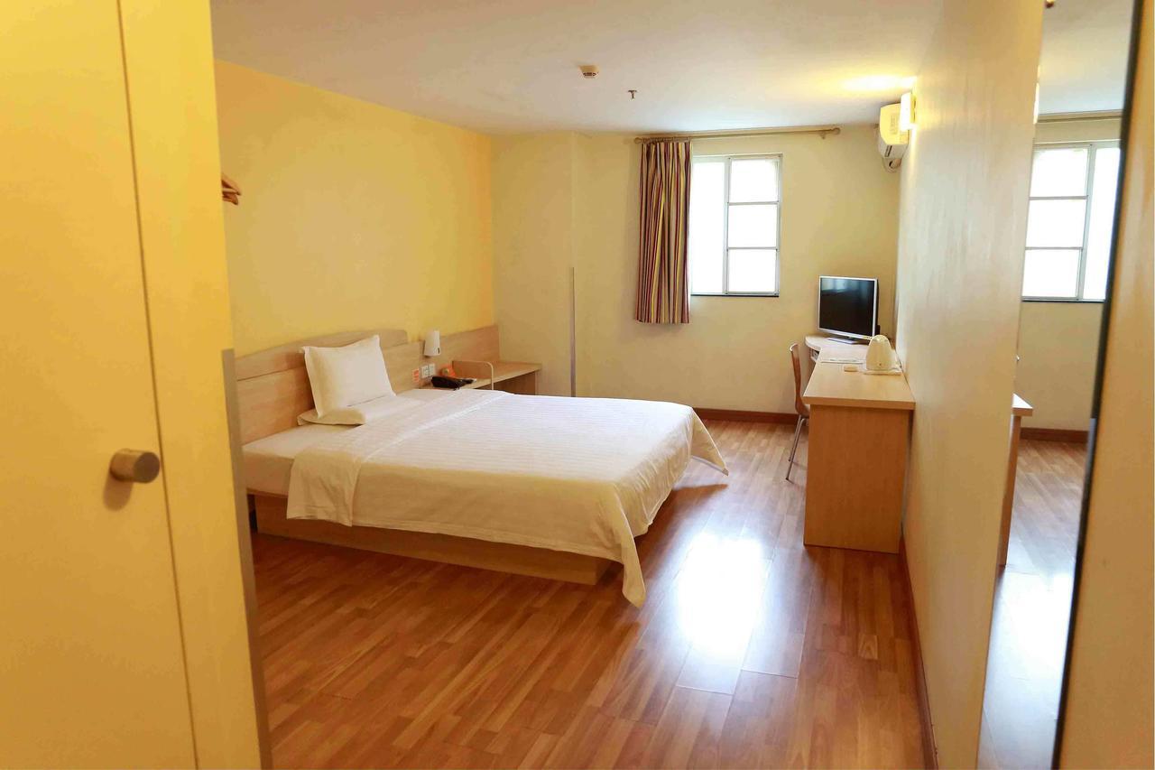 7Days Inn Lingshui Beidou Road Kamer foto